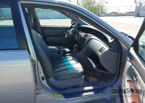 2003 Toyota Avalon Xls from USA, damaged, VIN 4T1BF28B83U317574